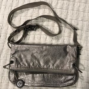 The Sak crossbody fold-over metallic leather purse